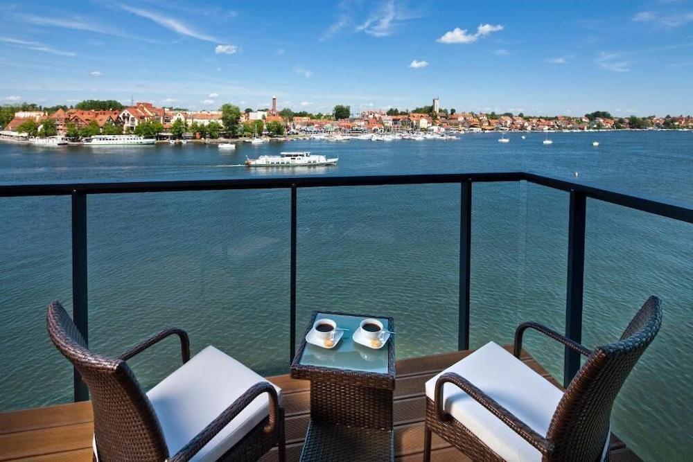Hotel Mikolajki Leisure & Spa - Destigo Hotels Exterior photo View of the town from the hotel